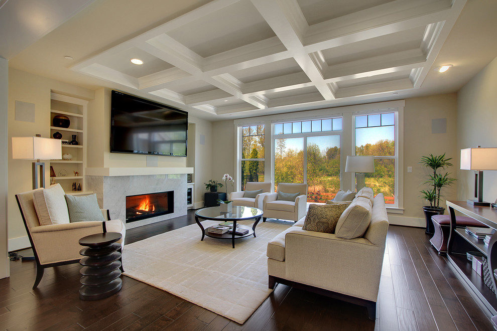 Photo of a large classic open plan living room in Seattle with beige walls, a wall mounted tv, dark hardwood flooring, a ribbon fireplace, a stone fireplace surround, brown floors and feature lighting.