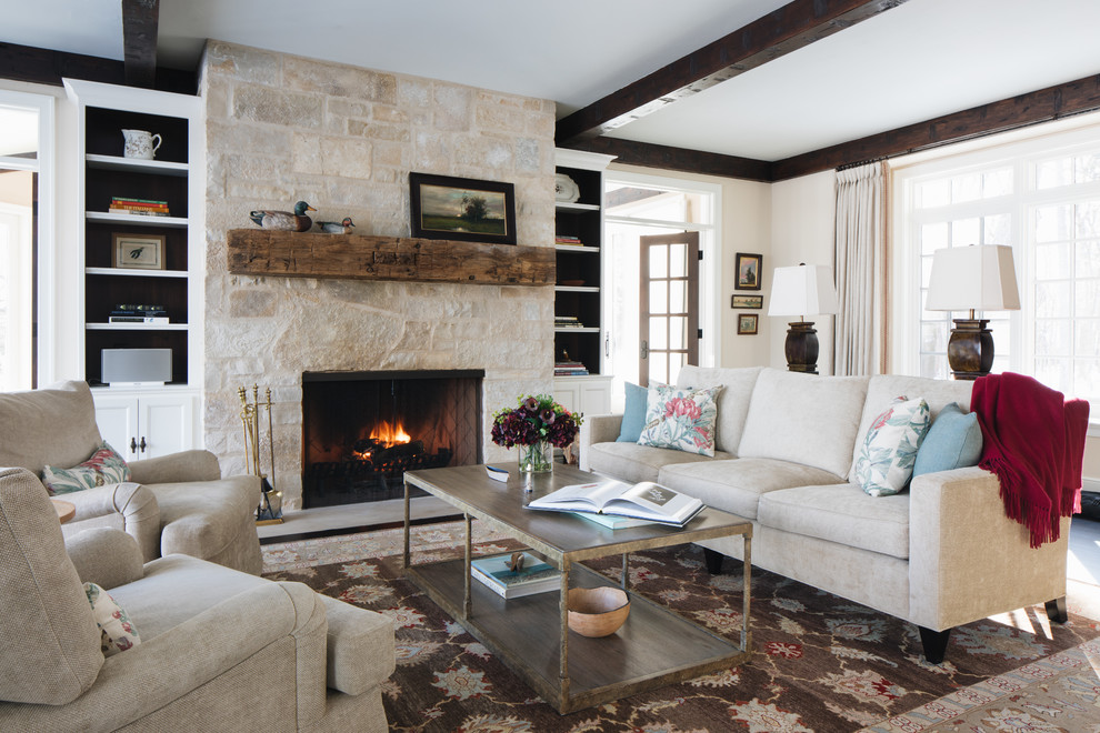 This is an example of a coastal formal enclosed living room in Chicago with a standard fireplace, a stone fireplace surround and no tv.