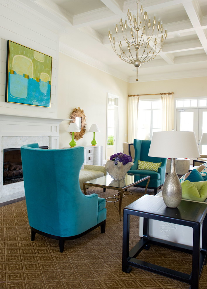 This is an example of a large contemporary living room in Atlanta with beige walls and a standard fireplace.