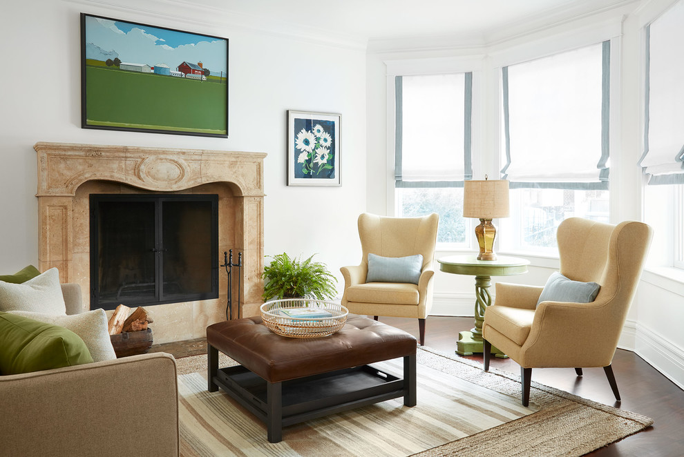 Example of a transitional formal and enclosed dark wood floor and brown floor living room design in Chicago with white walls, a standard fireplace and a tile fireplace