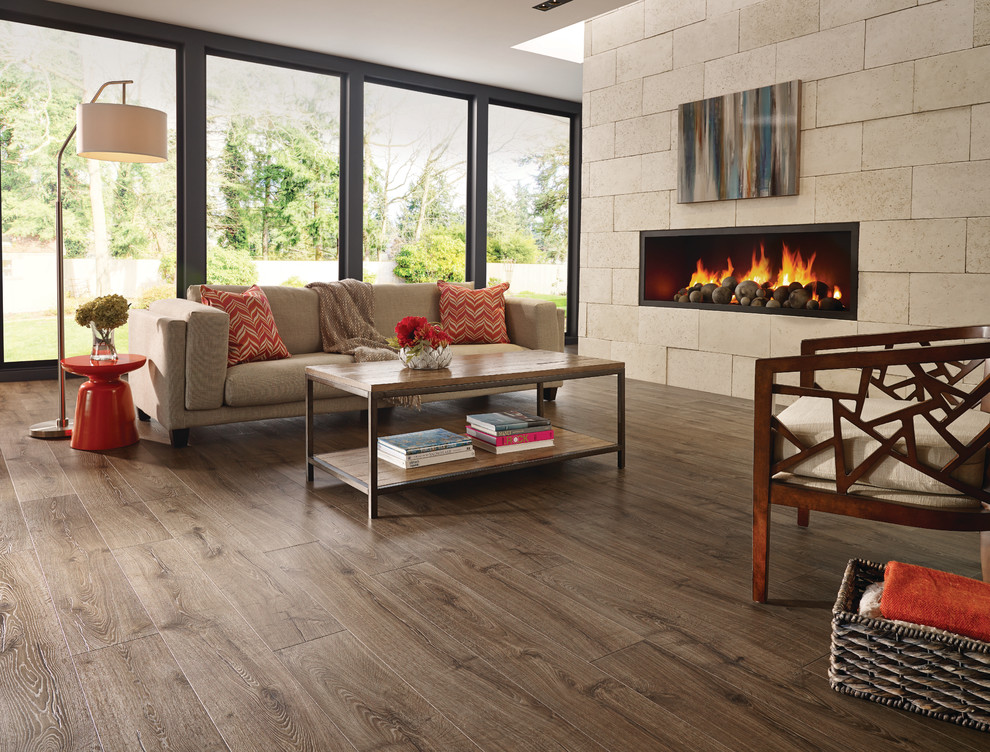 Inspiration for a large transitional open concept medium tone wood floor living room remodel in Toronto with beige walls and a ribbon fireplace