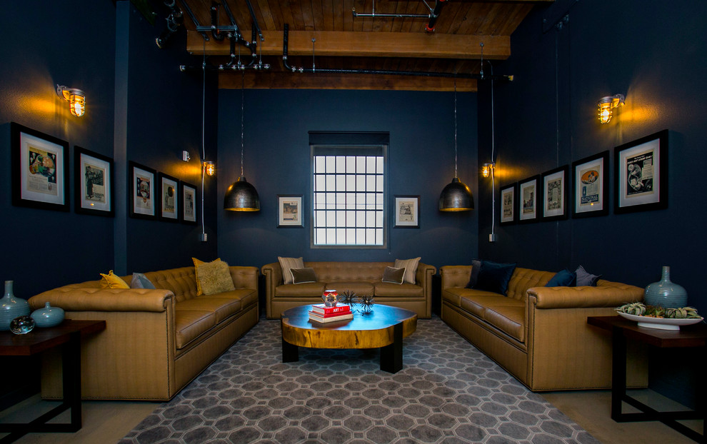 Großes, Fernseherloses Industrial Wohnzimmer im Loft-Stil mit Betonboden und blauer Wandfarbe in San Francisco