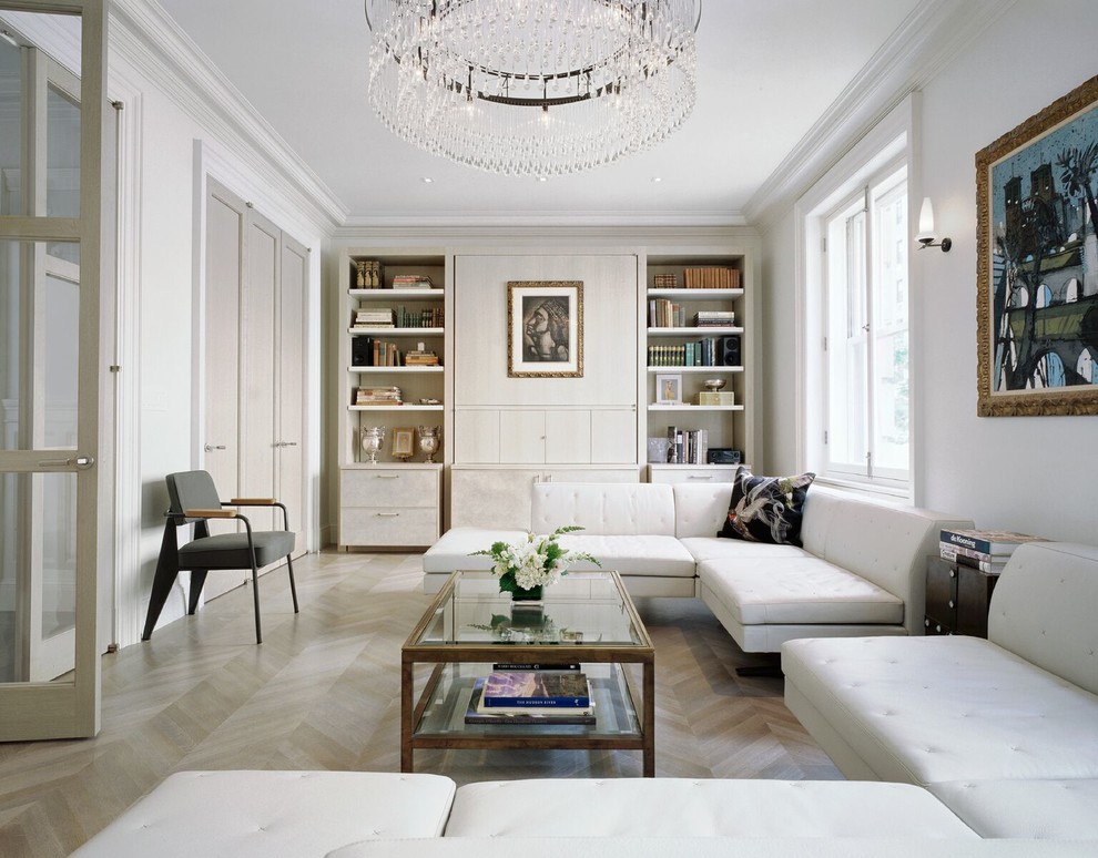 Living room - traditional formal light wood floor and beige floor living room idea in New York with white walls