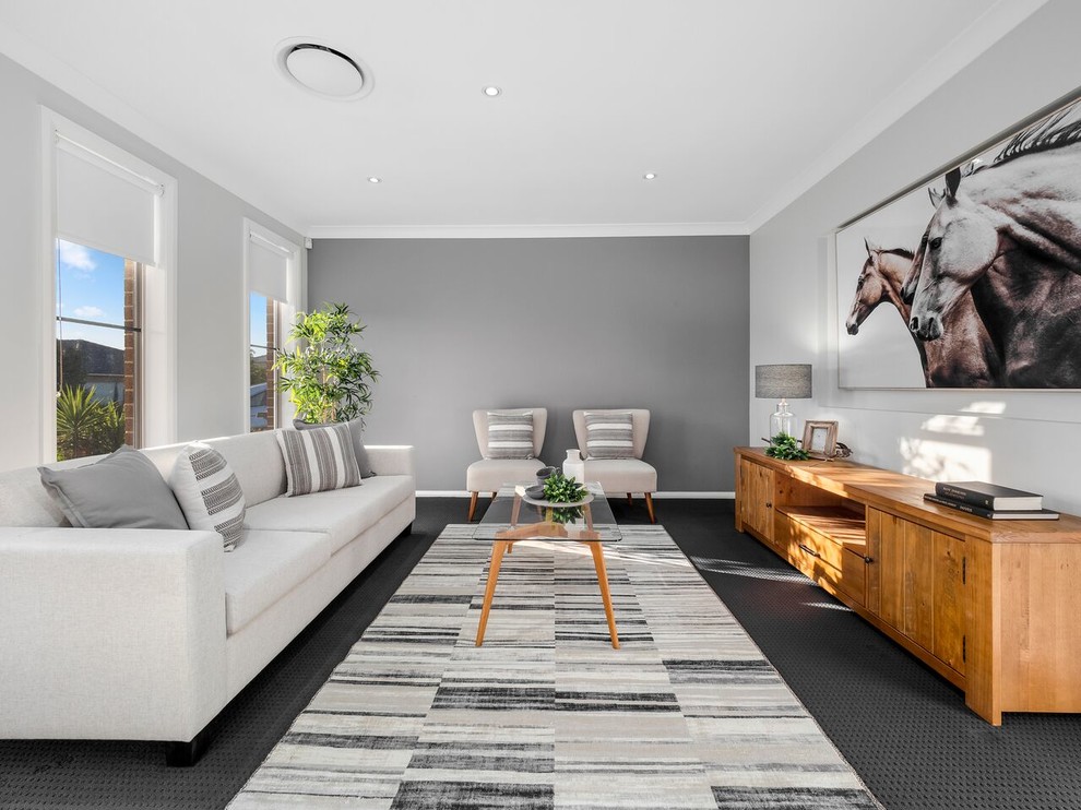 Esempio di un soggiorno minimal con pareti grigie, moquette e pavimento grigio