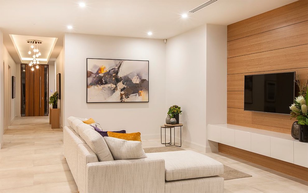Example of a large minimalist formal and open concept porcelain tile living room design in Adelaide with white walls and a wall-mounted tv