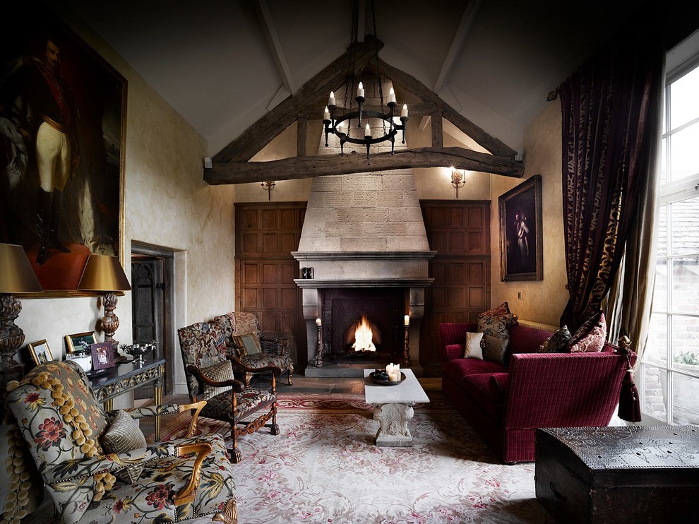 Inspiration for a large rustic formal enclosed living room in Cheshire with yellow walls, slate flooring, a standard fireplace, a stone fireplace surround and no tv.