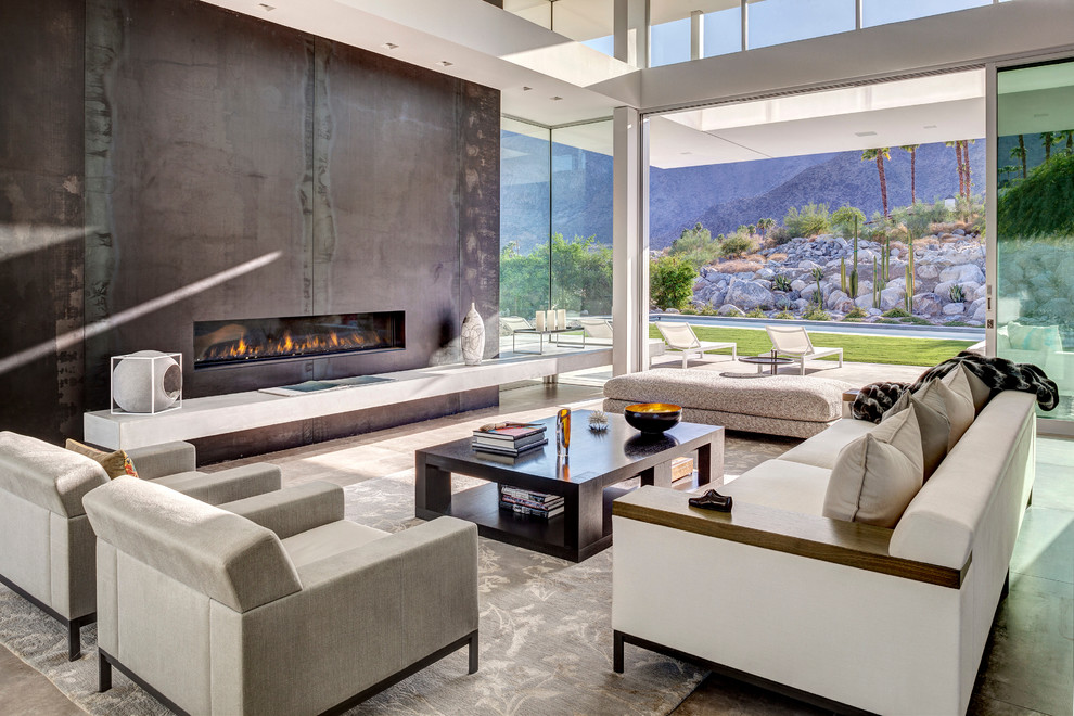 Midcentury formal open plan living room in Los Angeles with a ribbon fireplace.