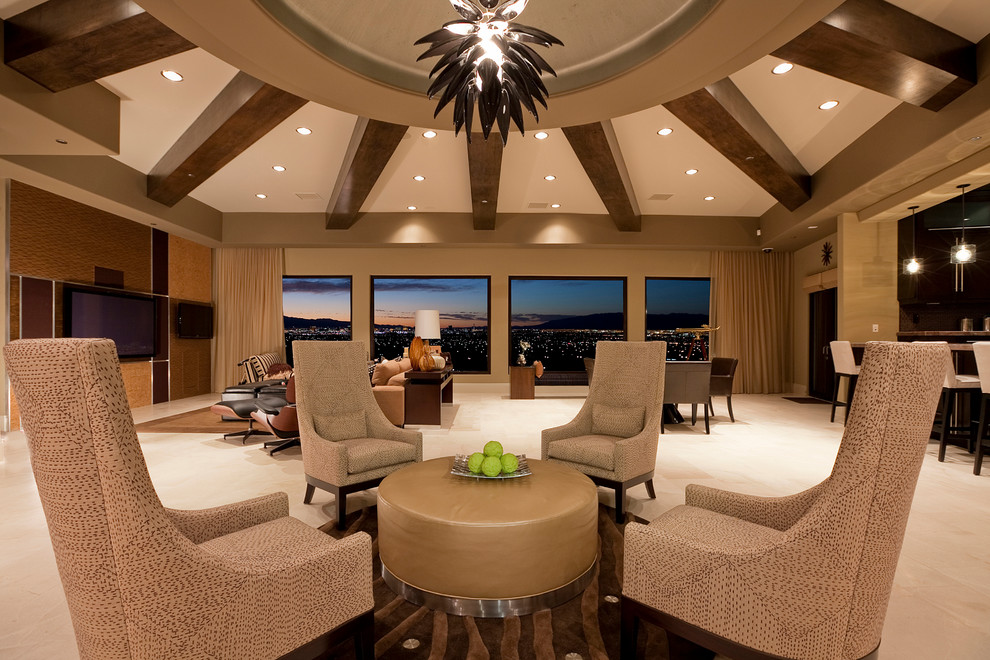 Expansive contemporary living room in Las Vegas with beige walls and feature lighting.