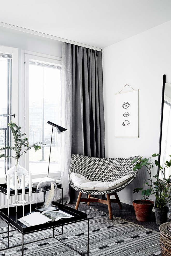 Inspiration for a scandinavian dark wood floor living room remodel in Other with white walls