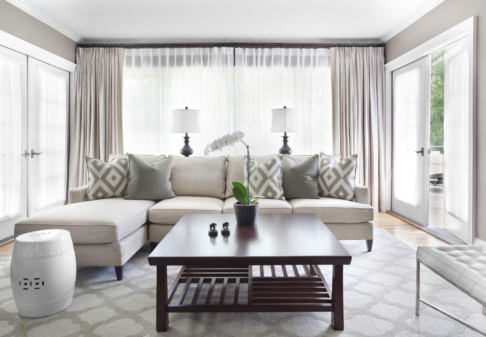 Elegant living room photo in Atlanta with gray walls