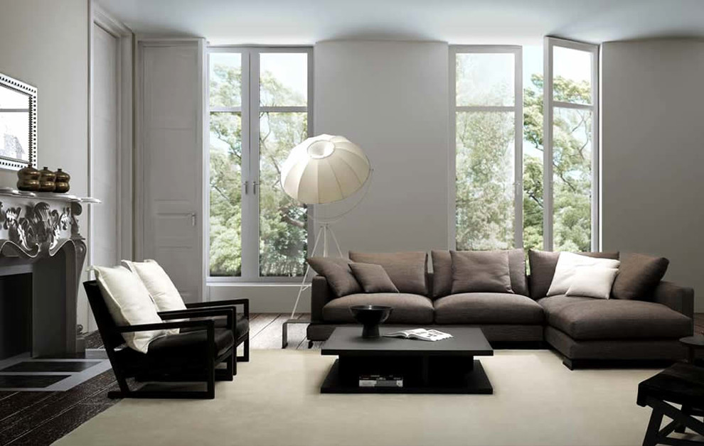 Foto di un soggiorno minimalista con pareti grigie
