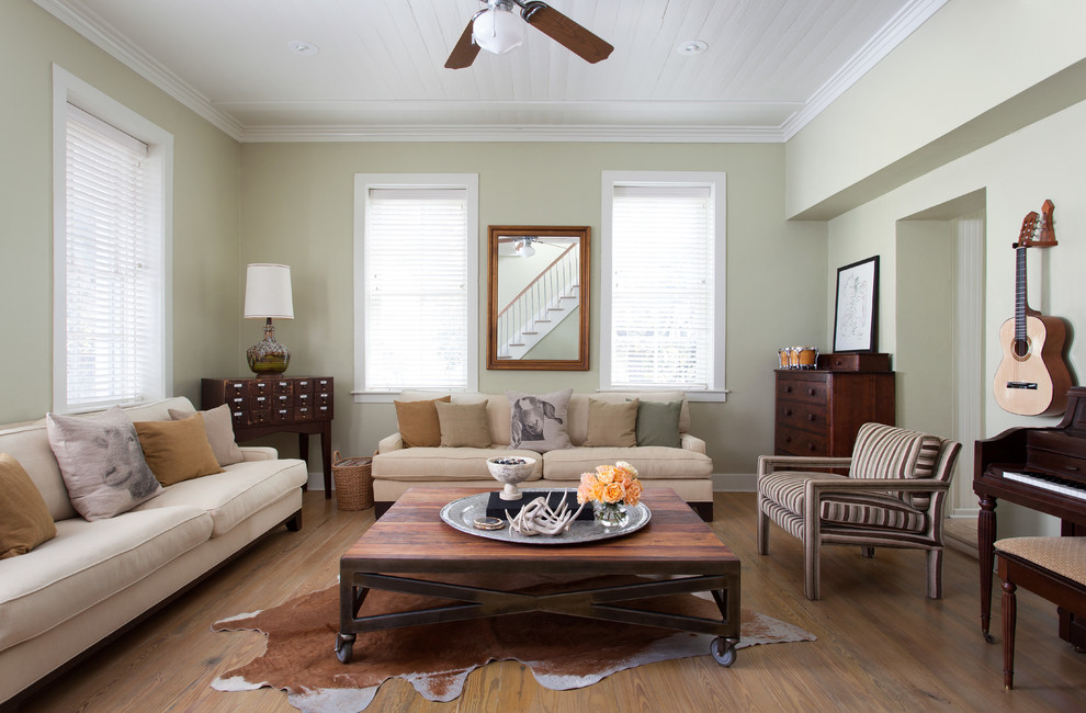 Living room - mid-sized farmhouse formal and enclosed light wood floor and beige floor living room idea in Austin with green walls, no fireplace and no tv