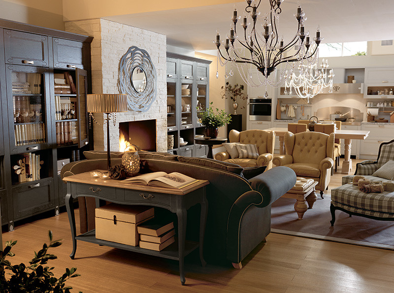 Example of a mid-sized transitional open concept light wood floor living room library design in New York with white walls and a two-sided fireplace
