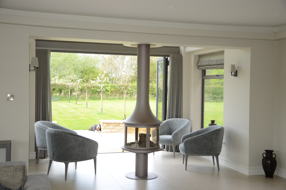 Inspiration for a medium sized rural open plan living room in Cheshire with ceramic flooring and a hanging fireplace.