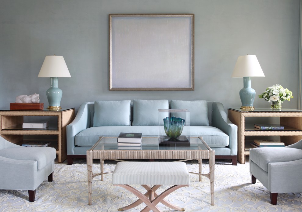 Immagine di un soggiorno design di medie dimensioni e chiuso con sala formale, pareti blu, camino classico, cornice del camino in pietra e nessuna TV