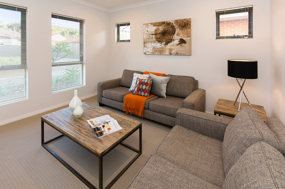 Стильный дизайн: парадная, изолированная гостиная комната среднего размера в современном стиле с серыми стенами и ковровым покрытием - последний тренд