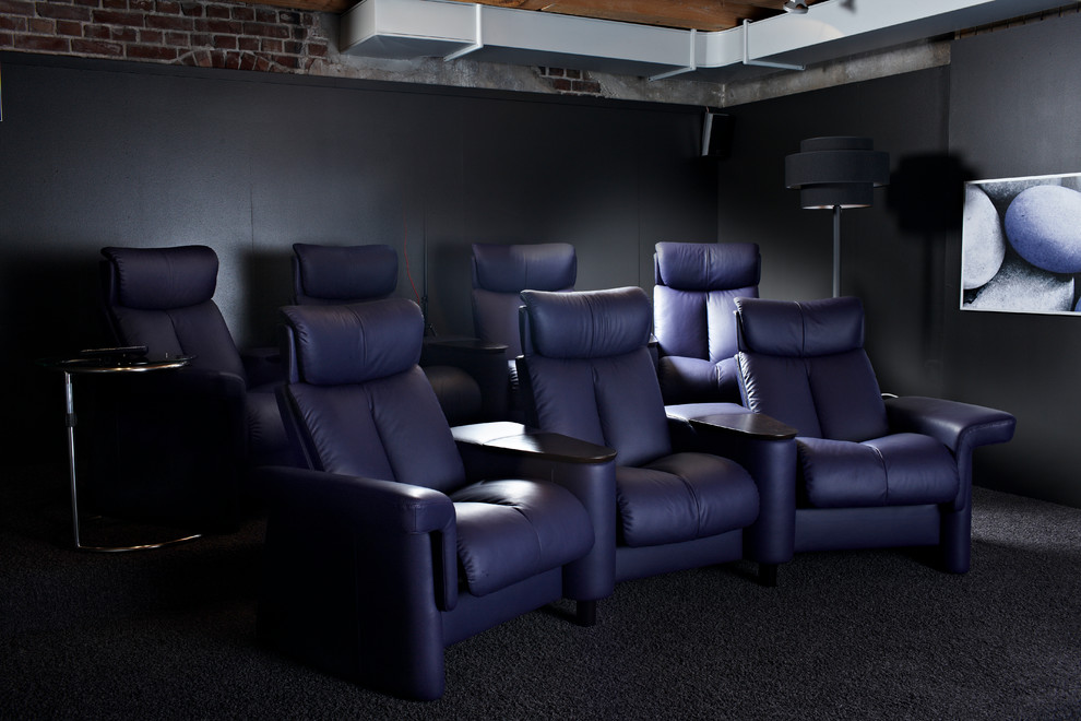 This is an example of a medium sized contemporary enclosed home cinema in Los Angeles.