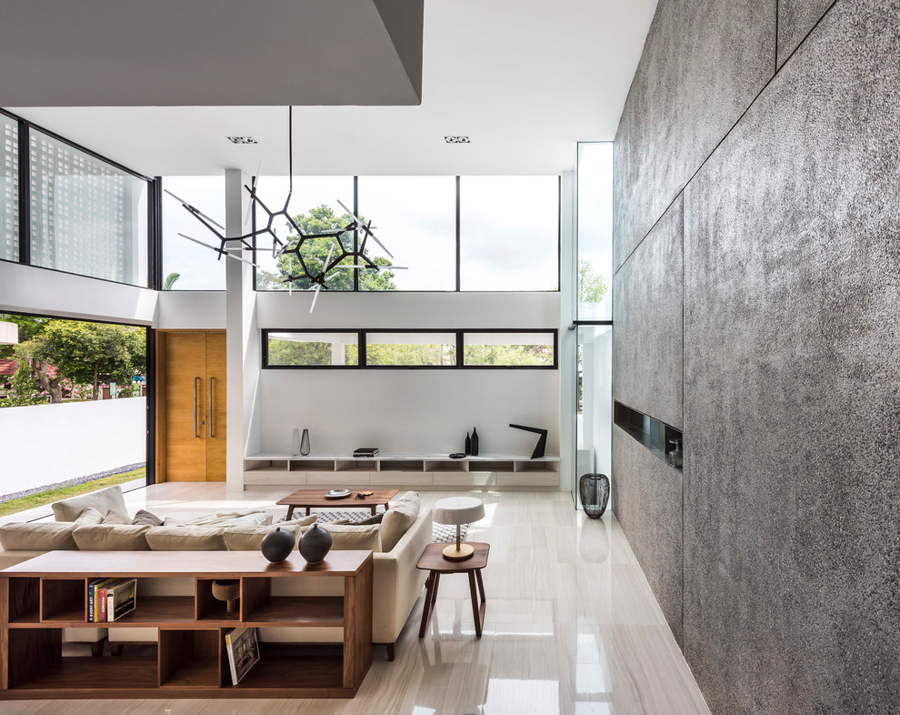 Fernseherloses, Offenes Modernes Wohnzimmer mit grauer Wandfarbe und beigem Boden in Singapur
