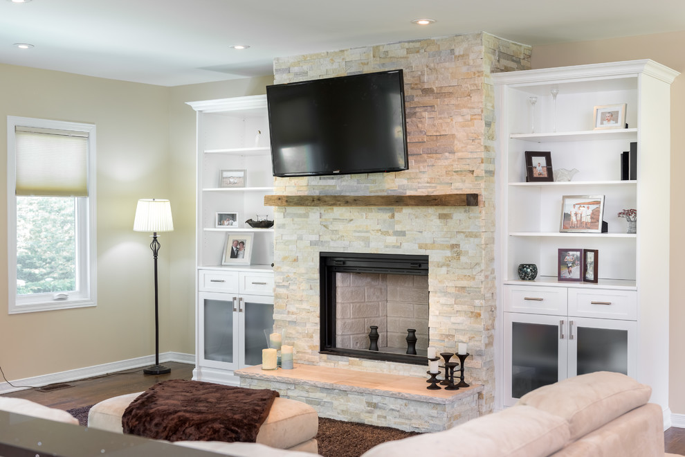 Photo of a medium sized contemporary open plan living room in Ottawa with a music area, white walls, carpet, a standard fireplace, a brick fireplace surround, a wall mounted tv and brown floors.