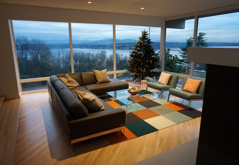 Photo of a medium sized contemporary formal open plan living room in Seattle with white walls, light hardwood flooring, no fireplace and no tv.