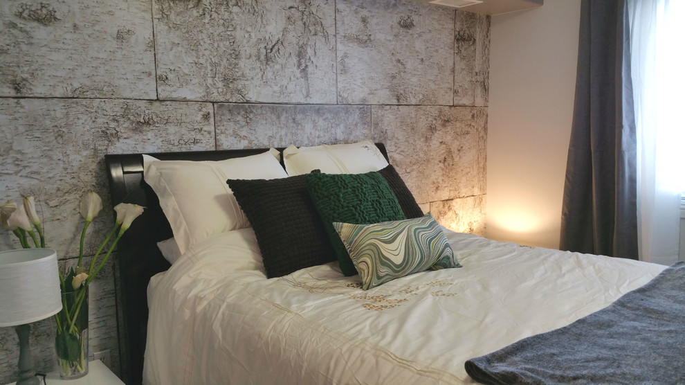 Aménagement d'une petite chambre moderne avec un mur gris, parquet clair et cheminée suspendue.
