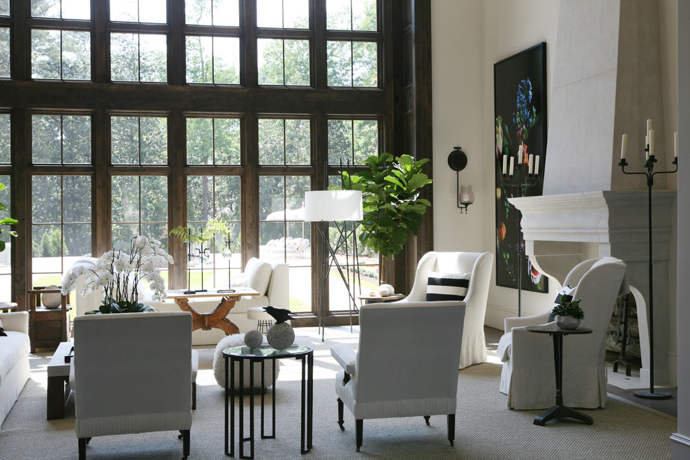 Foto di un soggiorno classico con sala formale, pareti bianche e camino classico