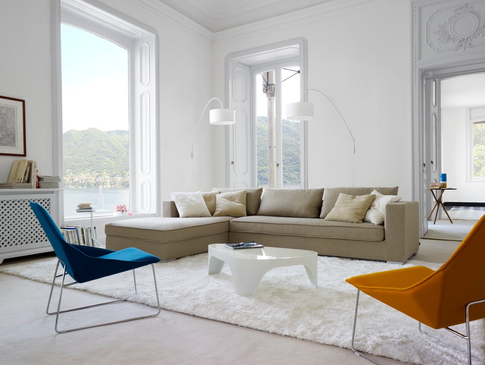 Example of a large trendy living room design in New York with white walls