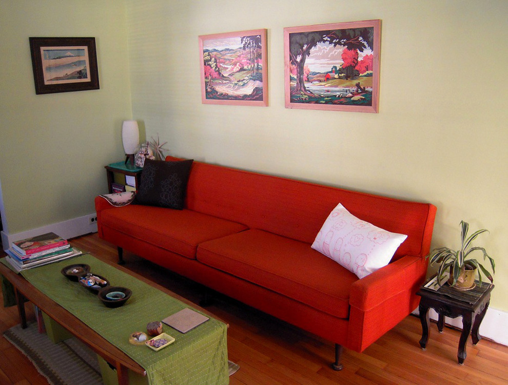 Foto di un soggiorno eclettico con pareti verdi
