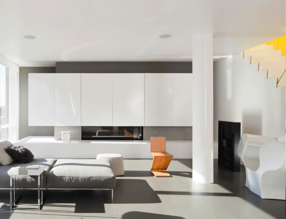 Modernes Wohnzimmer mit grauer Wandfarbe, Linoleum, Hängekamin und Kaminumrandung aus Beton in Sonstige