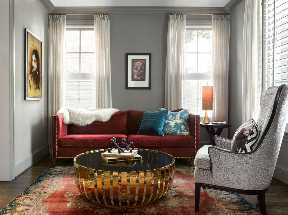 This is an example of a small traditional living room in Nashville with grey walls, dark hardwood flooring and brown floors.