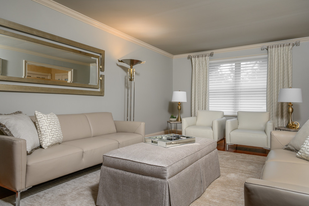 Стильный дизайн: парадная, изолированная гостиная комната среднего размера в стиле модернизм с серыми стенами и паркетным полом среднего тона - последний тренд