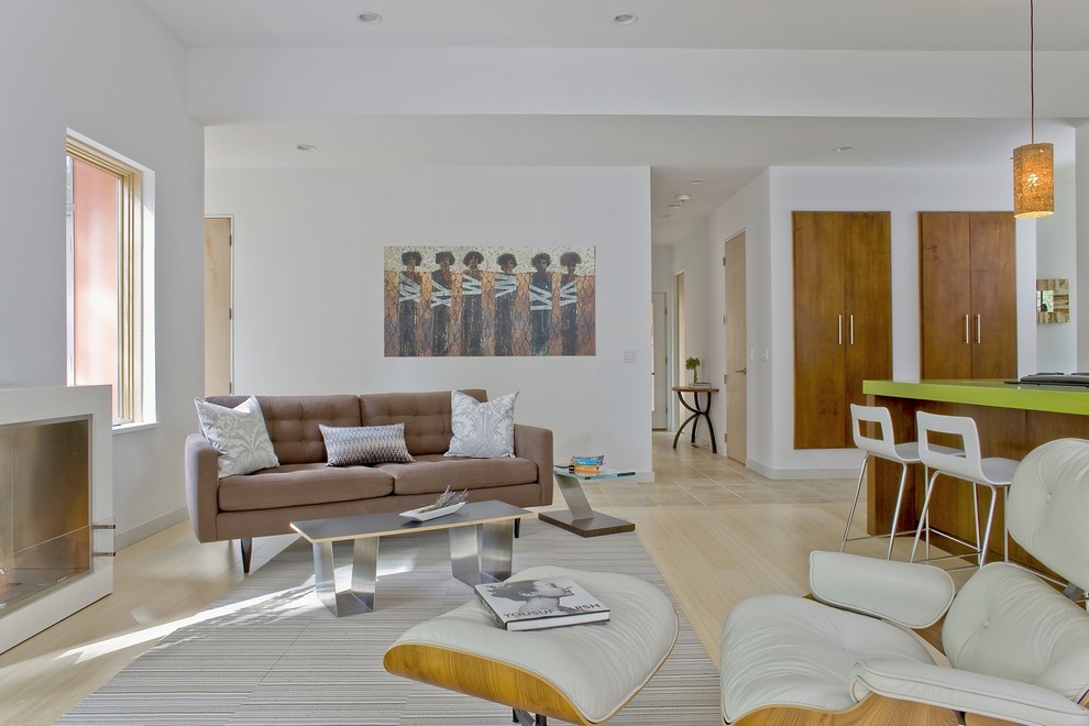 Minimalist open concept living room photo in Boston with white walls