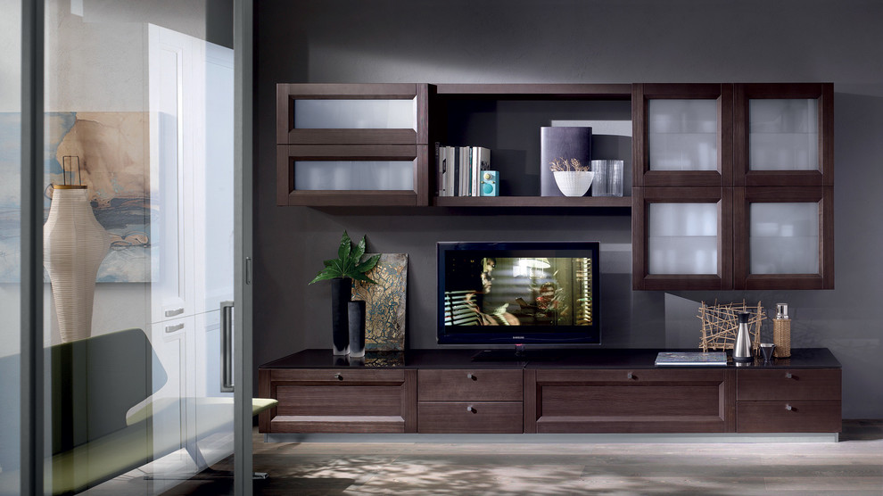 Ejemplo de salón abierto moderno de tamaño medio sin chimenea con suelo de madera clara, televisor independiente y paredes grises
