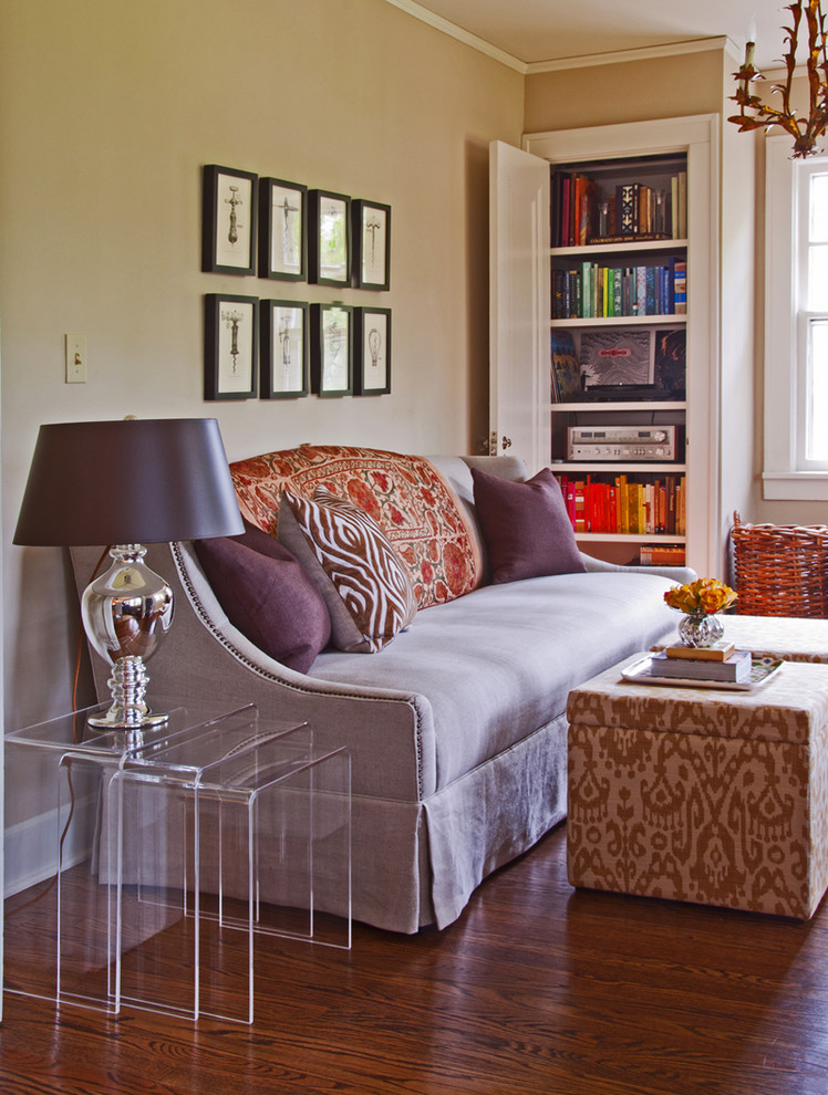 Inspiration for an eclectic living room remodel in Kansas City with beige walls