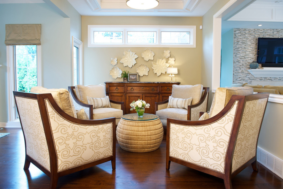 Living room - traditional dark wood floor living room idea in Cleveland with beige walls