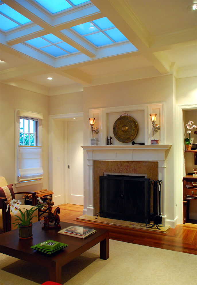 Inspiration for a timeless medium tone wood floor living room remodel in San Francisco