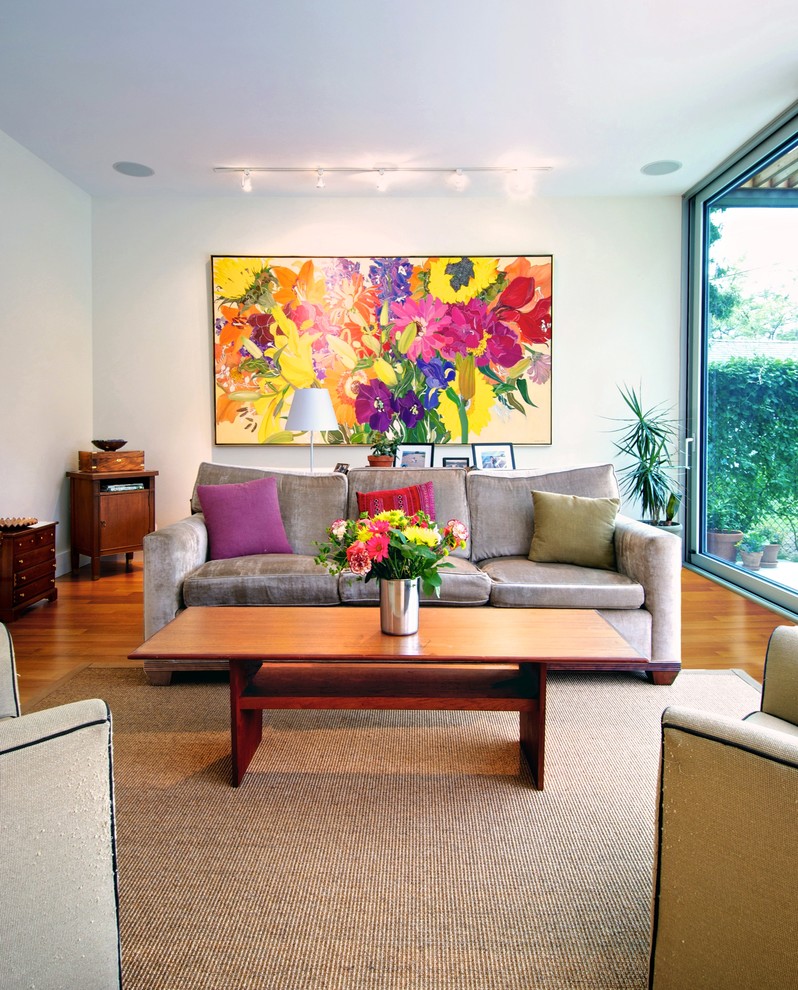 Inspiration for a modern living room remodel in Toronto with white walls