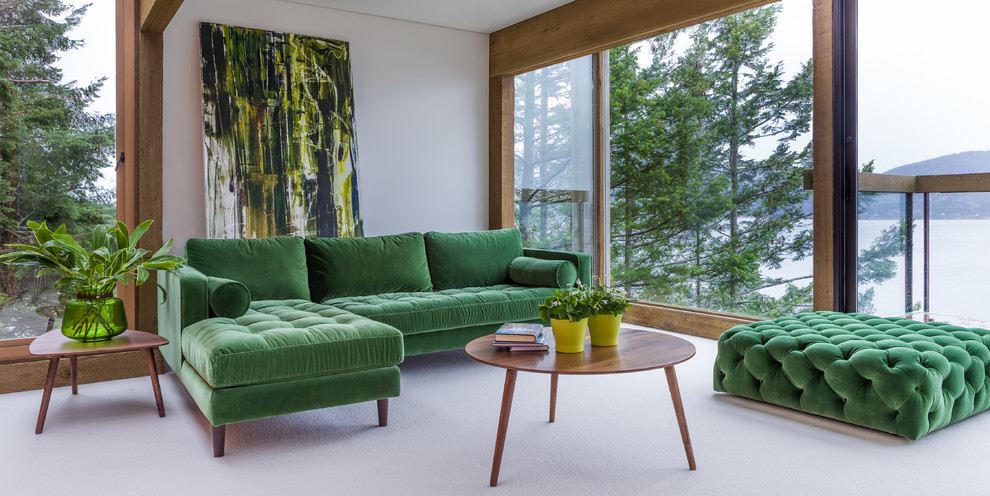 Inspiration for a large mid-century modern enclosed carpeted living room remodel in Vancouver with white walls