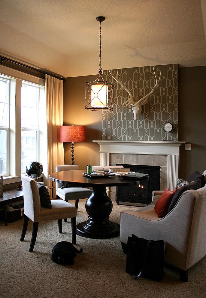 Living room - transitional living room idea in Portland with gray walls and a standard fireplace