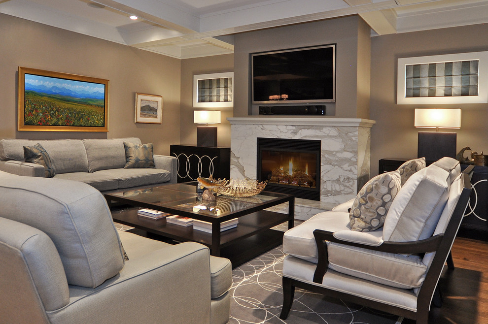 Inspiration for a classic living room in Calgary with a stone fireplace surround, brown walls, medium hardwood flooring, a standard fireplace and a wall mounted tv.