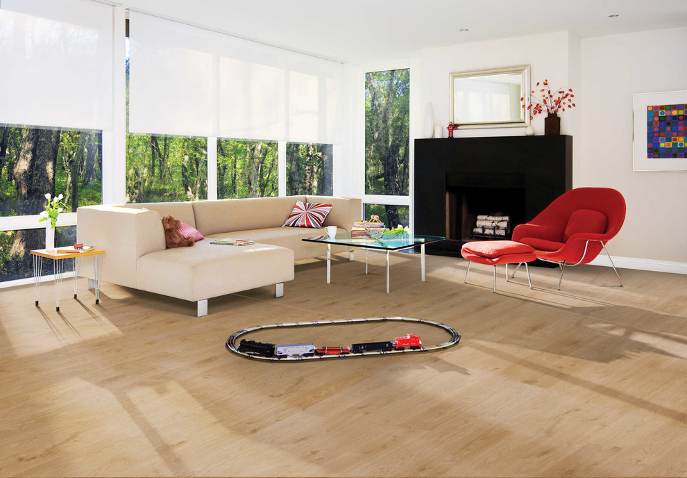 Inspiration for a medium sized modern living room in Manchester with beige floors.
