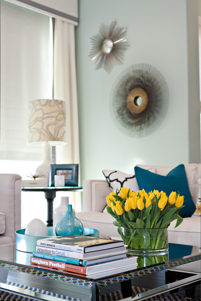 Example of a trendy living room design in Dallas with blue walls