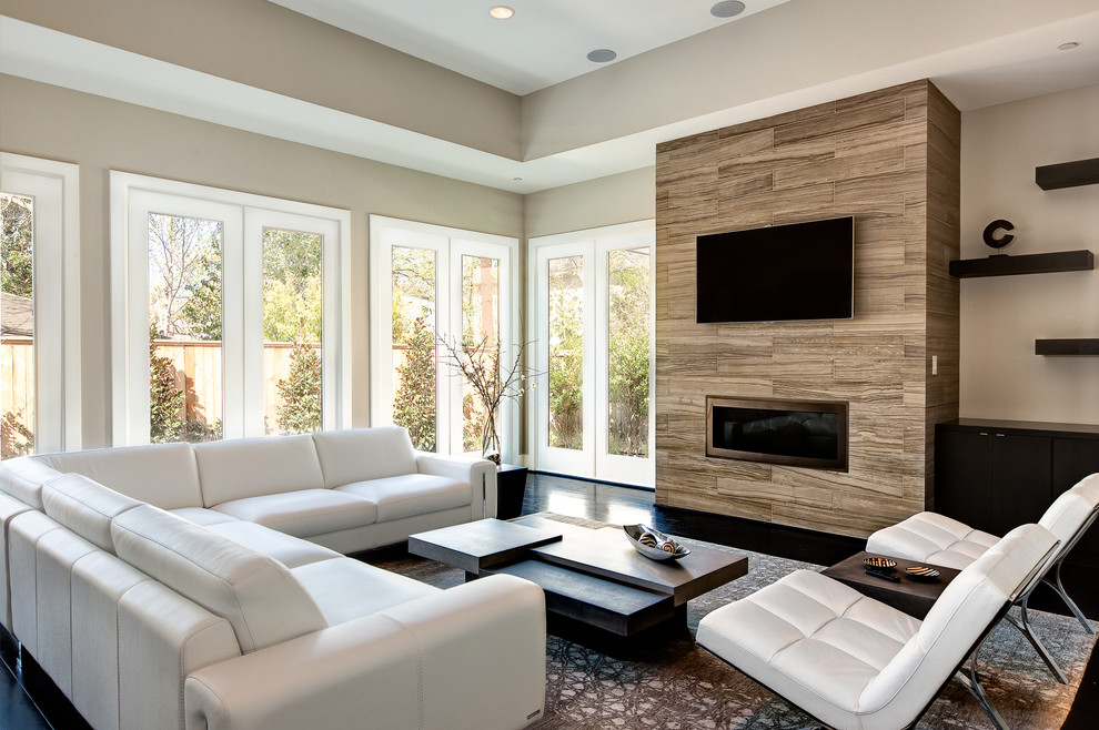 Mid-sized trendy formal and open concept dark wood floor living room photo in Houston with a ribbon fireplace, a wall-mounted tv and beige walls