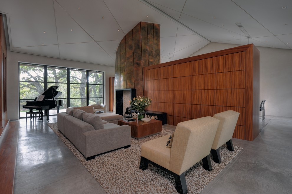 Свежая идея для дизайна: открытая гостиная комната среднего размера в современном стиле с музыкальной комнатой и стандартным камином - отличное фото интерьера