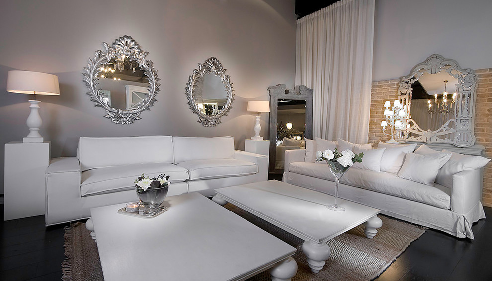 Living room - contemporary living room idea in Other with white walls