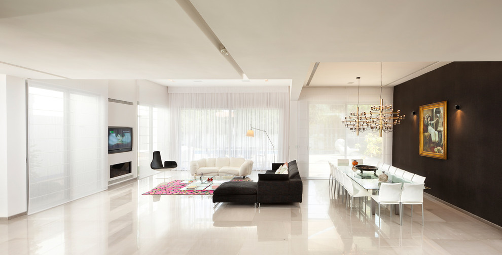 Expansive modern living room feature wall in Other with beige floors.