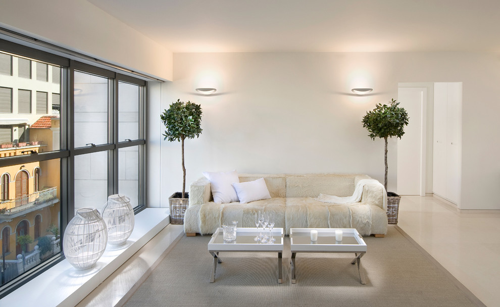 Idee per un soggiorno minimal con pareti bianche