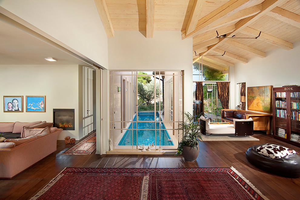 Inspiration for a contemporary living room remodel in Other with beige walls