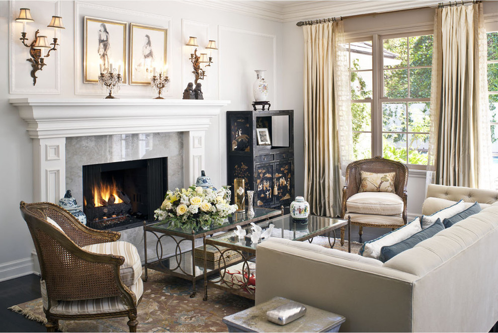 Medium sized classic formal enclosed living room in Los Angeles with grey walls, dark hardwood flooring, a standard fireplace, no tv and brown floors.