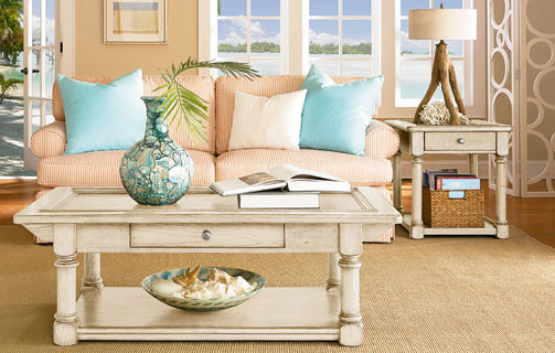 Example of a medium tone wood floor living room design in San Francisco with beige walls